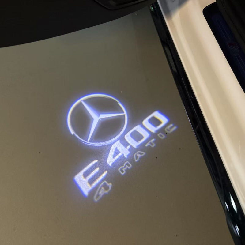 MERCEDES BENZ E400 LOGO PROJECTOT LIGHTS  (quantity 1 = 1 set /2 door lights with 2 logo films)Nr.02M84