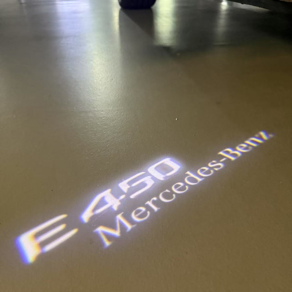 MERCEDES BENZ E450 LOGO PROJECTOT LIGHTS  (quantity 1 = 1 set /2 door lights with 2 logo films)Nr.02M81
