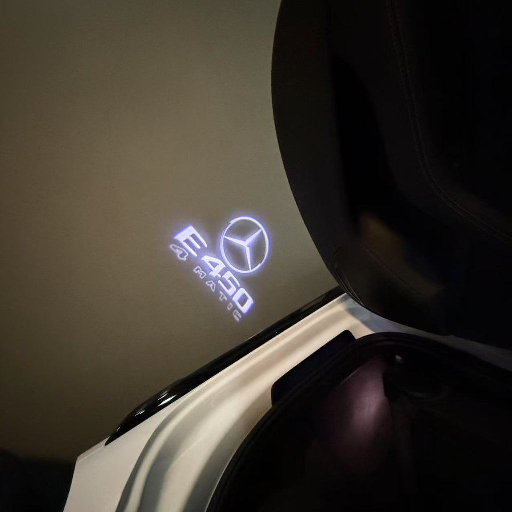 MERCEDES BENZ Original LOGO PROJECTOT LIGHTS Nr.02 (quantità 1 = 1 set/2 luci porta) 