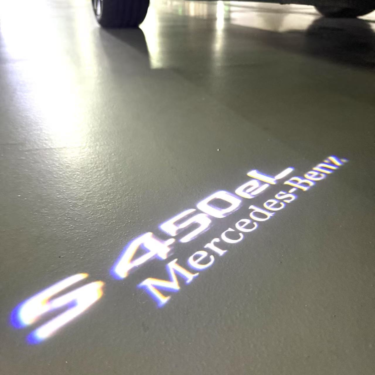 MERCEDES BENZ S400 LOGO PROJECTOT LIGHTS  (quantity 1 = 1 set /2 door lights with 2 logo films)Nr.02M25