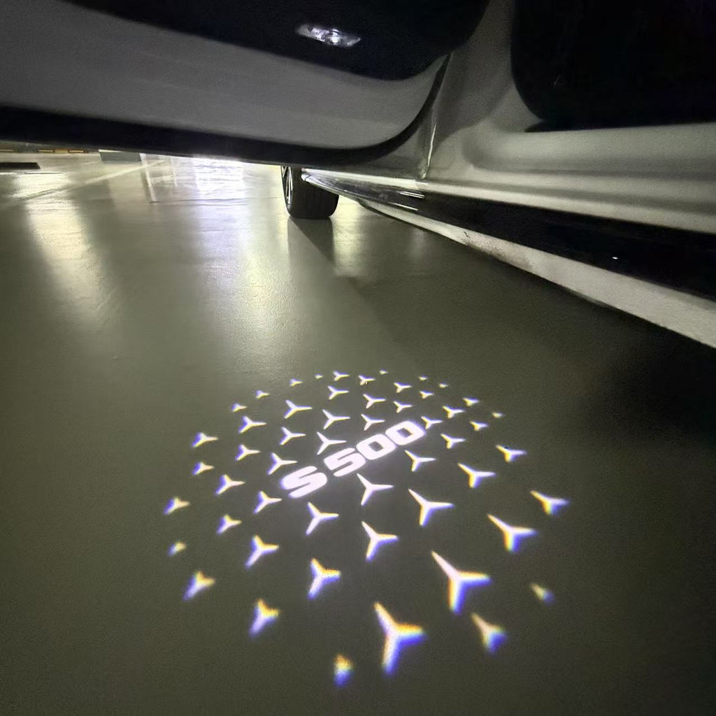 MERCEDES BENZ S500 LOGO PROJECTOT LIGHTS  (quantity 1 = 1 set /2 door lights with 2 logo films)Nr.02M35