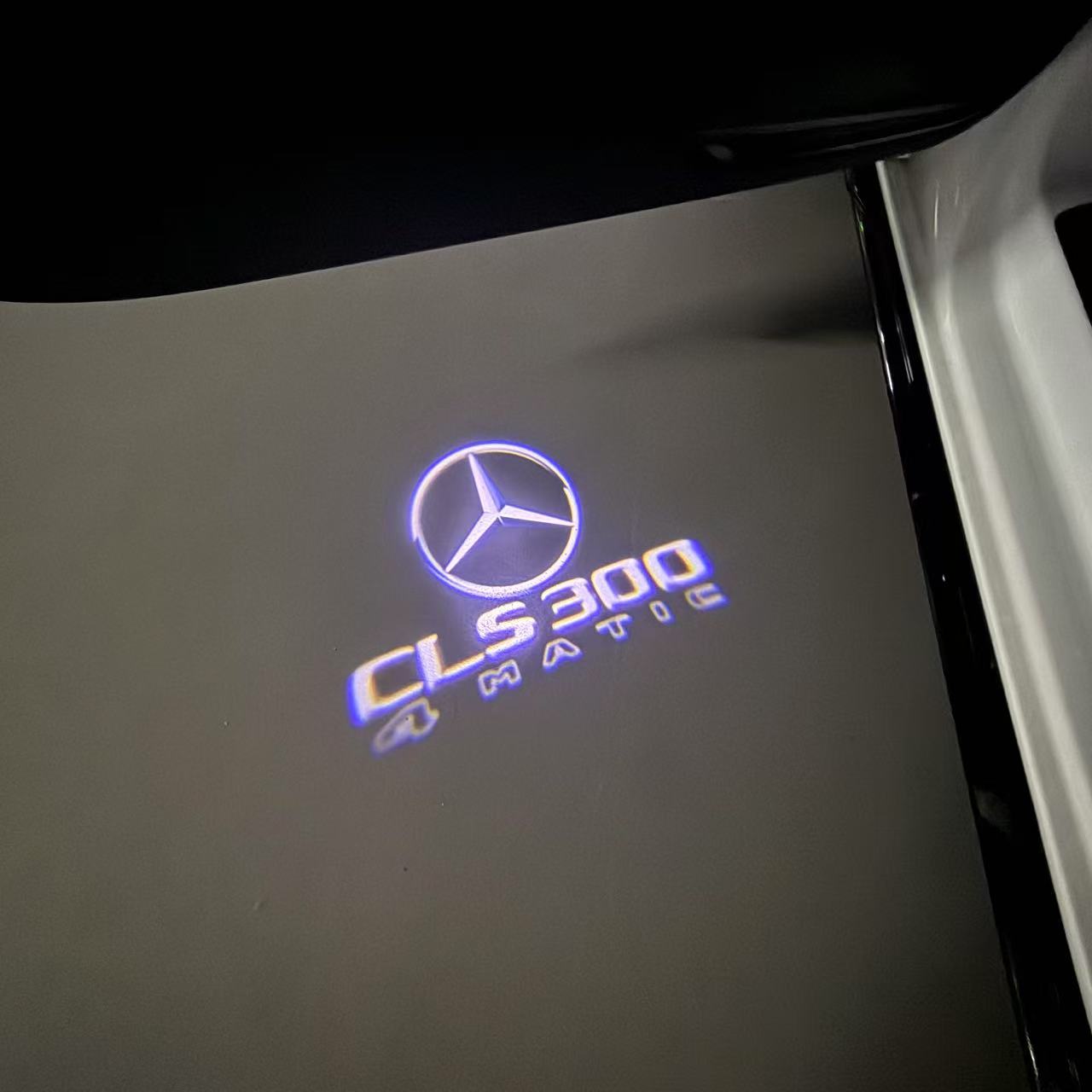 MERCEDES BENZ CLS 300 LOGO PROJECTOT LIGHTS  (quantity 1 = 1 set /2 door lights with 2 logo films)Nr.02M192