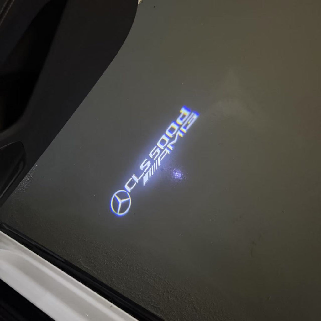 MERCEDES BENZ CLS 500d LOGO PROJECTOT LIGHTS  (quantity 1 = 1 set /2 door lights with 2 logo films)Nr.02M188