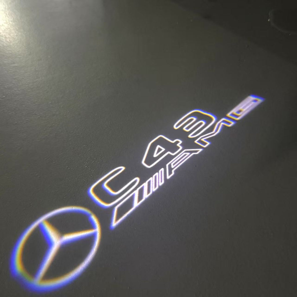 MERCEDES BENZ C43 AMG LOGO PROJECTOT LIGHTS  (quantity 1 = 1 set /2 door lights with 2 logo films)Nr.02M292