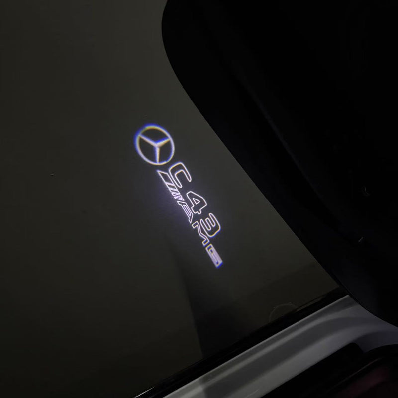 MERCEDES BENZ C43 AMG LOGO PROJECTOT LIGHTS  (quantity 1 = 1 set /2 door lights with 2 logo films)Nr.02M292