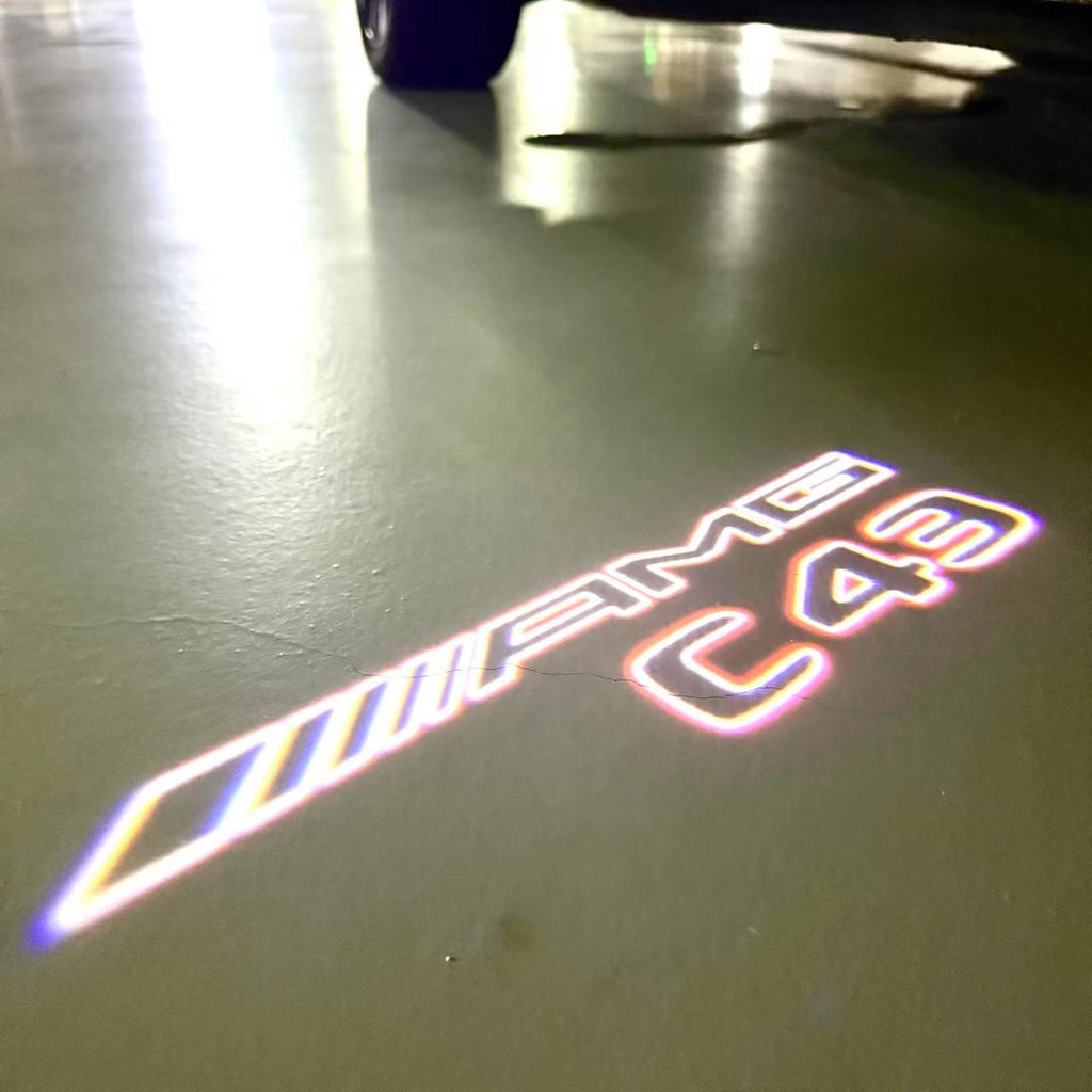 MERCEDES BENZ C43 AMG LOGO PROJECTOT LIGHTS  (quantity 1 = 1 set /2 door lights with 2 logo films)Nr.02M289