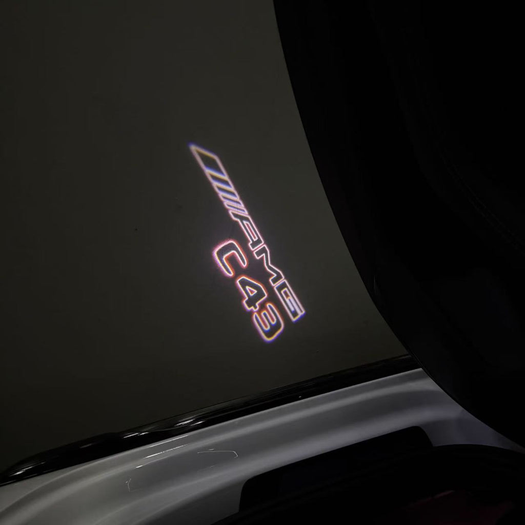 MERCEDES BENZ C43 AMG LOGO PROJECTOT LIGHTS  (quantity 1 = 1 set /2 door lights with 2 logo films)Nr.02M289