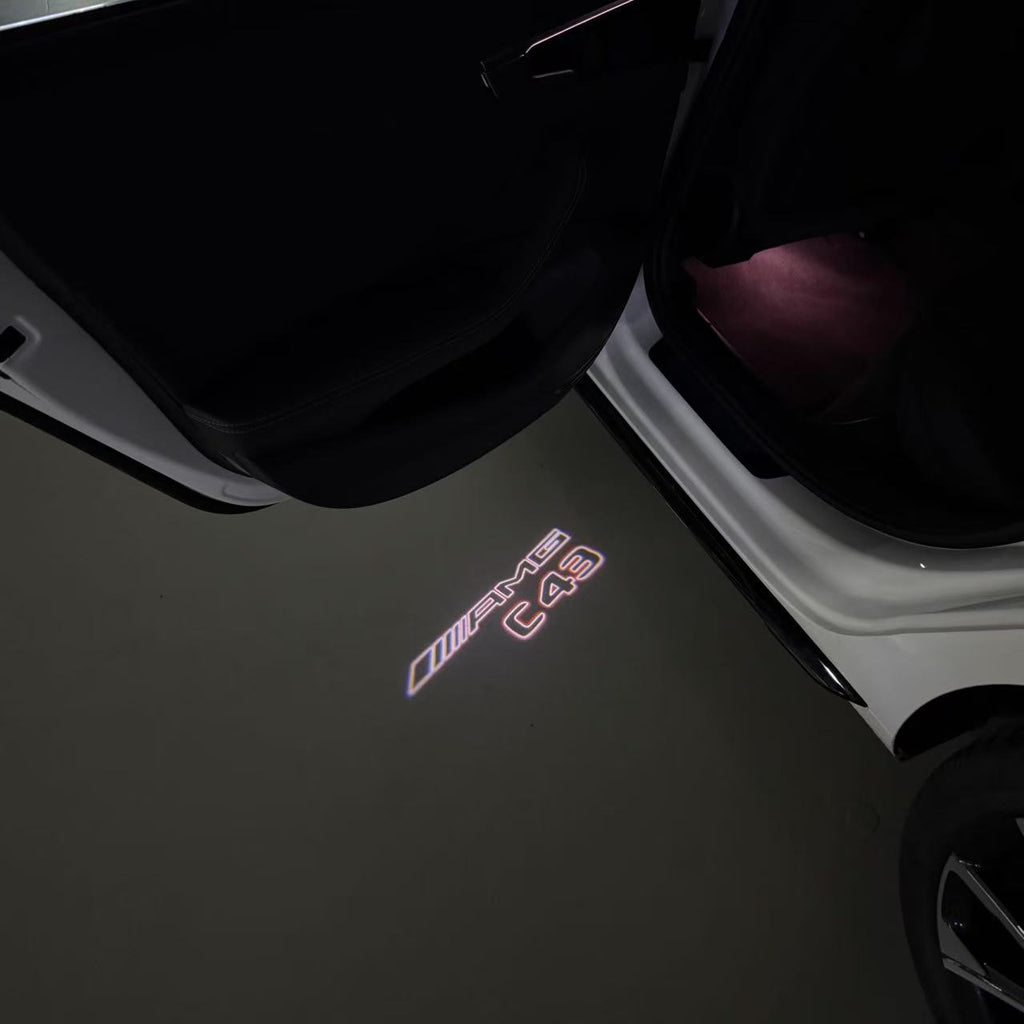 MERCEDES BENZ C43 AMG LOGO PROJECTOT LIGHTS  (quantity 1 = 1 set /2 door lights with 2 logo films)Nr.02M289