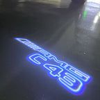 MERCEDES BENZ C43 AMG LOGO PROJECTOT LIGHTS  (quantity 1 = 1 set /2 door lights with 2 logo films)Nr.02M290