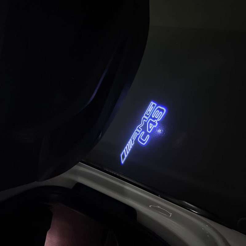 MERCEDES BENZ C43 AMG LOGO PROJECTOT LIGHTS  (quantity 1 = 1 set /2 door lights with 2 logo films)Nr.02M290