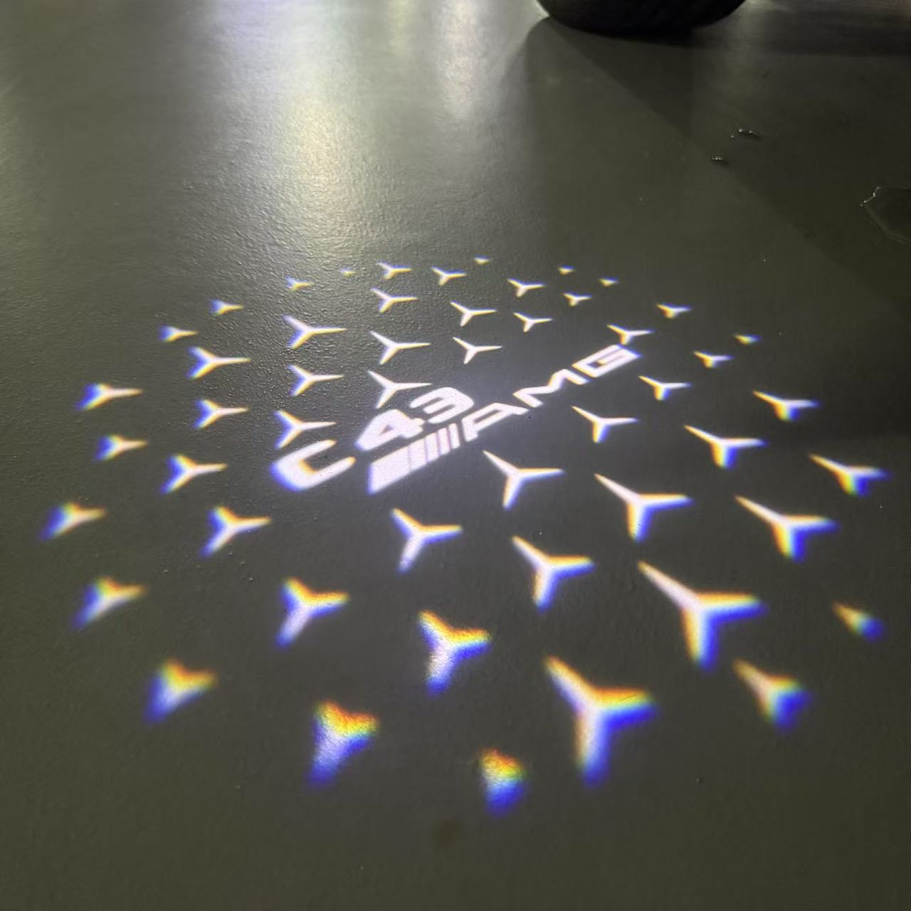 MERCEDES BENZ C43 AMG LOGO PROJECTOT LIGHTS  (quantity 1 = 1 set /2 door lights with 2 logo films)Nr.02M291