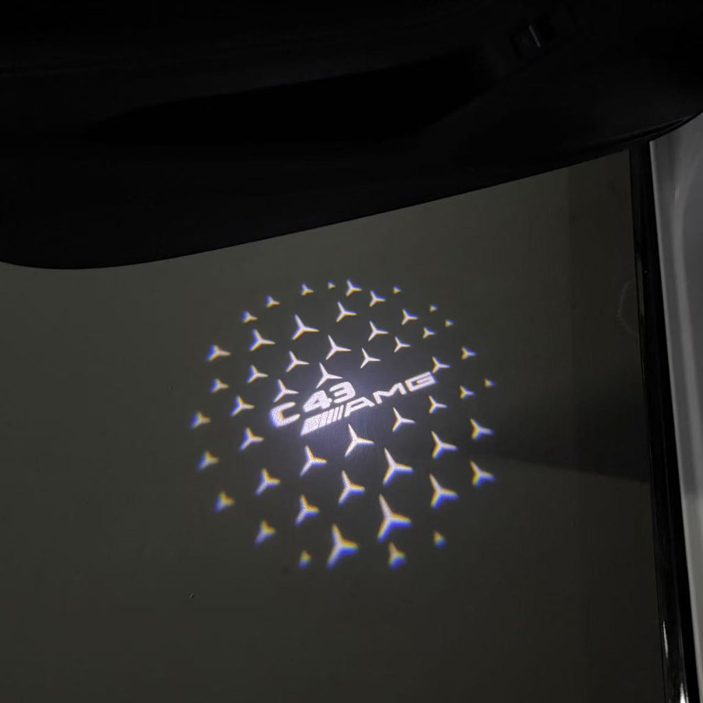 MERCEDES BENZ C43 AMG LOGO PROJECTOT LIGHTS  (quantity 1 = 1 set /2 door lights with 2 logo films)Nr.02M291