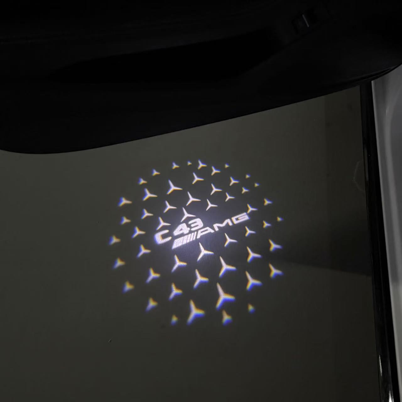 MERCEDES BENZ C43 AMG LOGO PROJECTOT LIGHTS  (quantity 1 = 1 set /2 door lights with 2 logo films)Nr.02M291