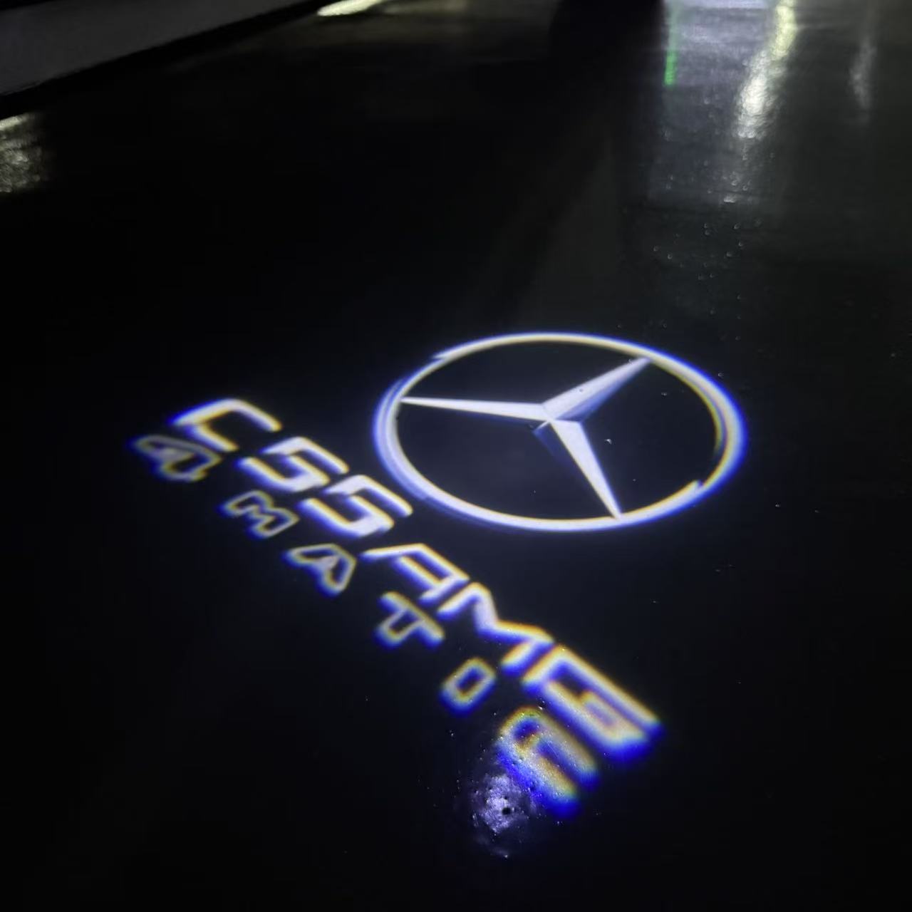 MERCEDES BENZ C55 AMG LOGO PROJECTOT LIGHTS  (quantity 1 = 1 set /2 door lights with 2 logo films)Nr.02M298