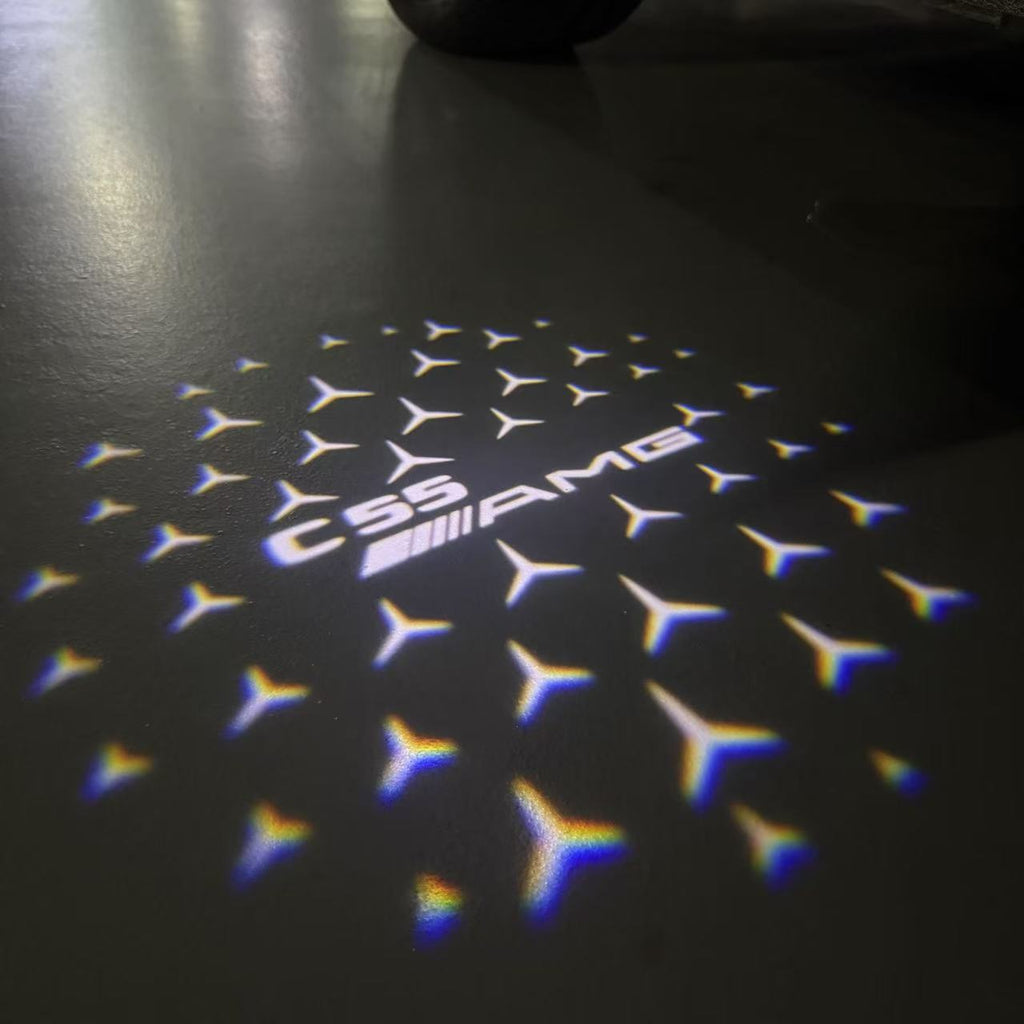 MERCEDES BENZ C55 AMG LOGO PROJECTOT LIGHTS  (quantity 1 = 1 set /2 door lights with 2 logo films)Nr.02M302