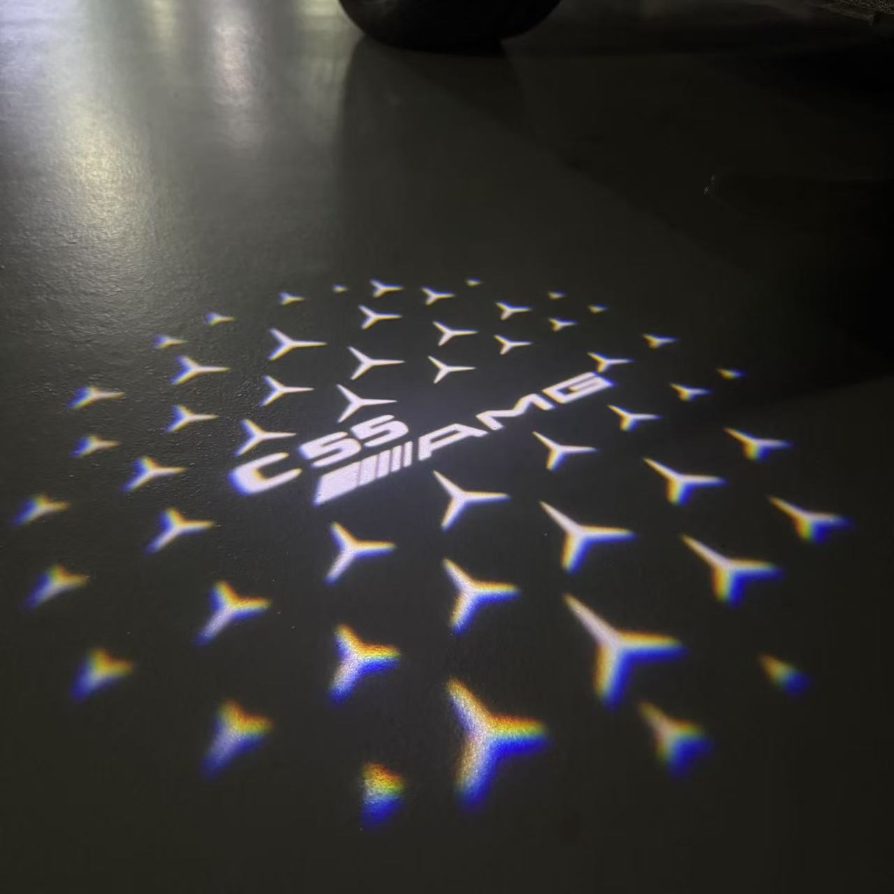 MERCEDES BENZ C55 AMG LOGO PROJECTOT LIGHTS  (quantity 1 = 1 set /2 door lights with 2 logo films)Nr.02M302