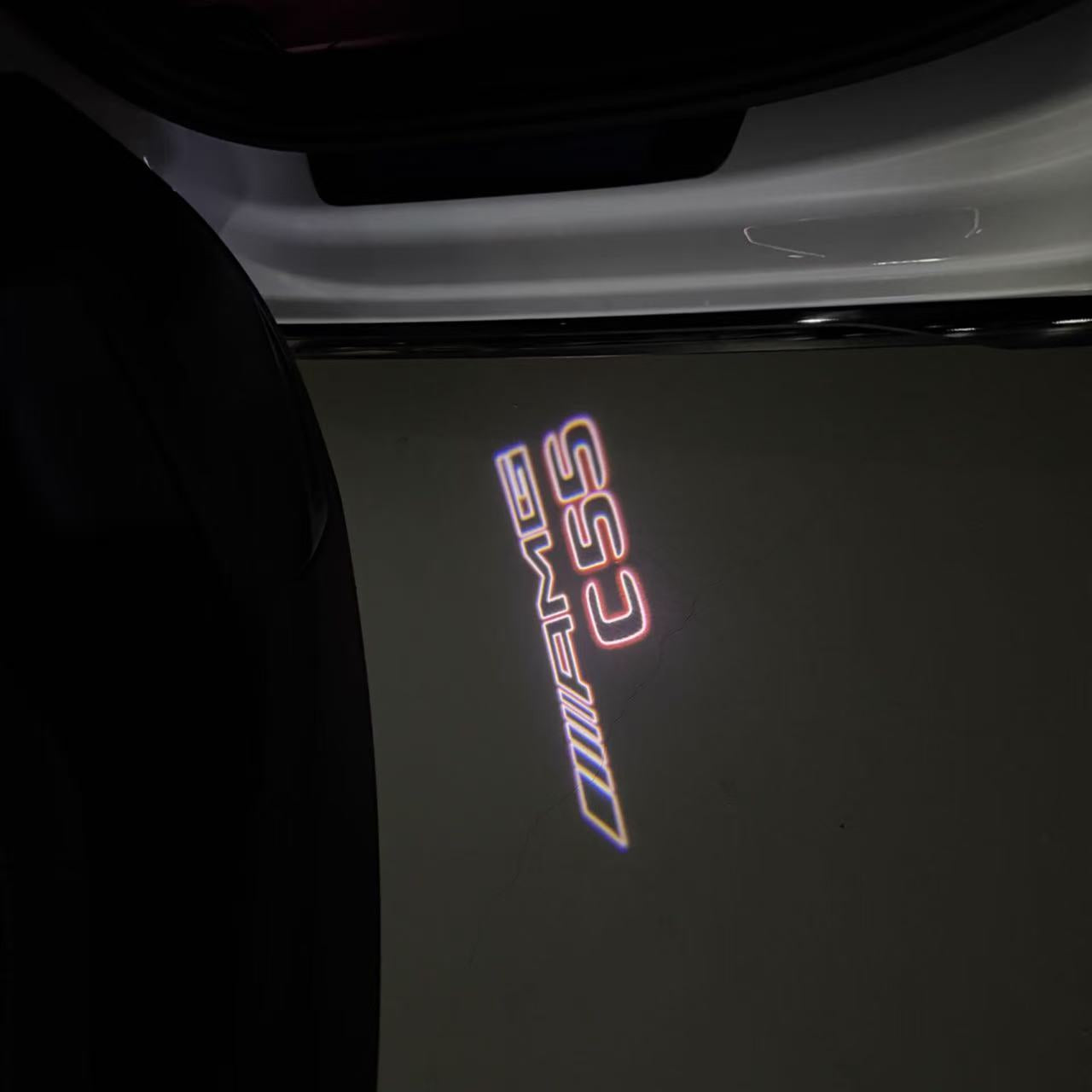 MERCEDES BENZ C55 AMG LOGO PROJECTOT LIGHTS  (quantity 1 = 1 set /2 door lights with 2 logo films)Nr.02M300