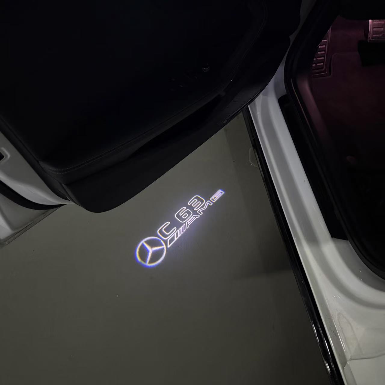 MERCEDES BENZ C63 AMG LOGO PROJECTOT LIGHTS  (quantity 1 = 1 set /2 door lights with 2 logo films)Nr.02M297