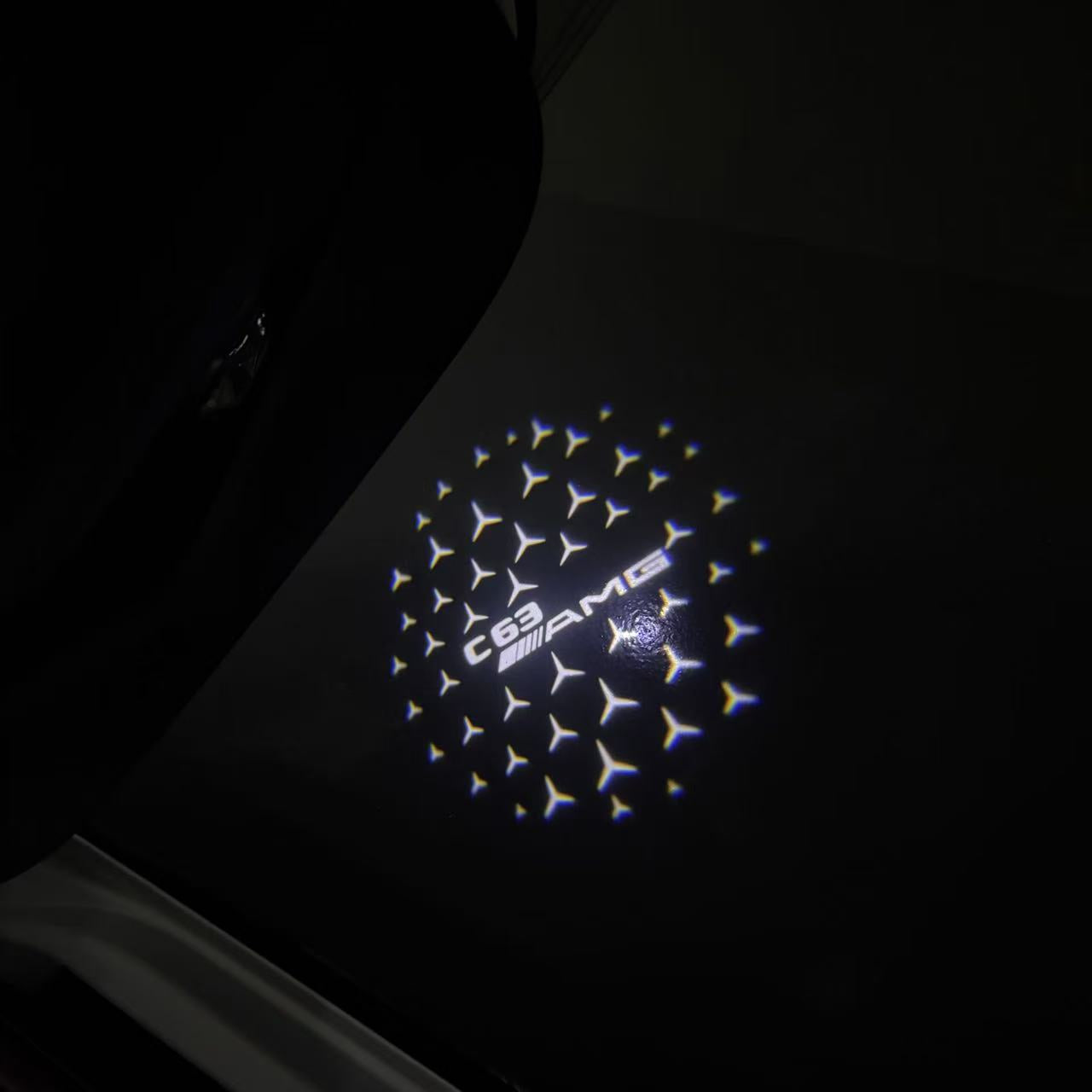 MERCEDES BENZ C63 AMG LOGO PROJECTOT LIGHTS  (quantity 1 = 1 set /2 door lights with 2 logo films)Nr.02M296