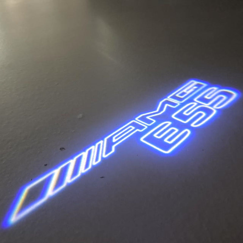 MERCEDES BENZ E55 AMG LOGO PROJECTOT LIGHTS  (quantity 1 = 1 set /2 door lights with 2 logo films)Nr.02M303