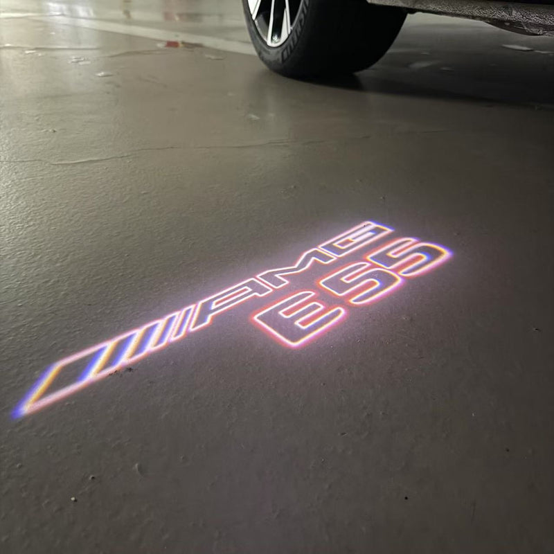 MERCEDES BENZ E55 AMG LOGO PROJECTOT LIGHTS  (quantity 1 = 1 set /2 door lights with 2 logo films)Nr.02M305