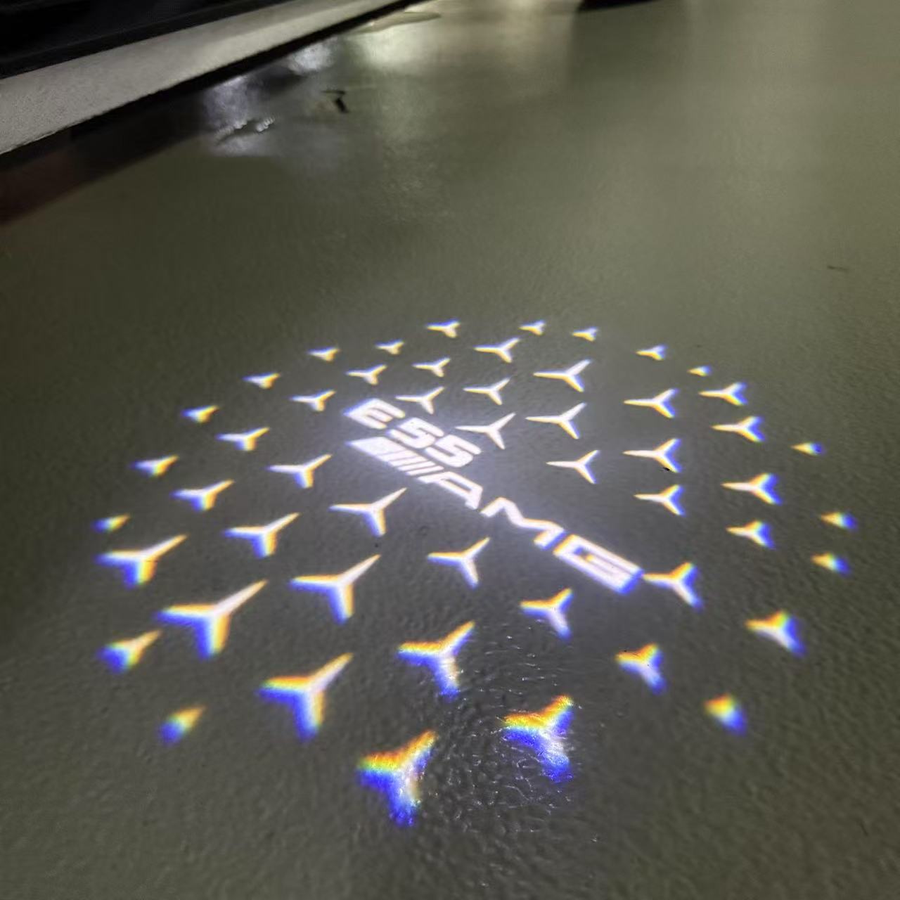 MERCEDES BENZ E55 AMG LOGO PROJECTOT LIGHTS  (quantity 1 = 1 set /2 door lights with 2 logo films)Nr.02M306