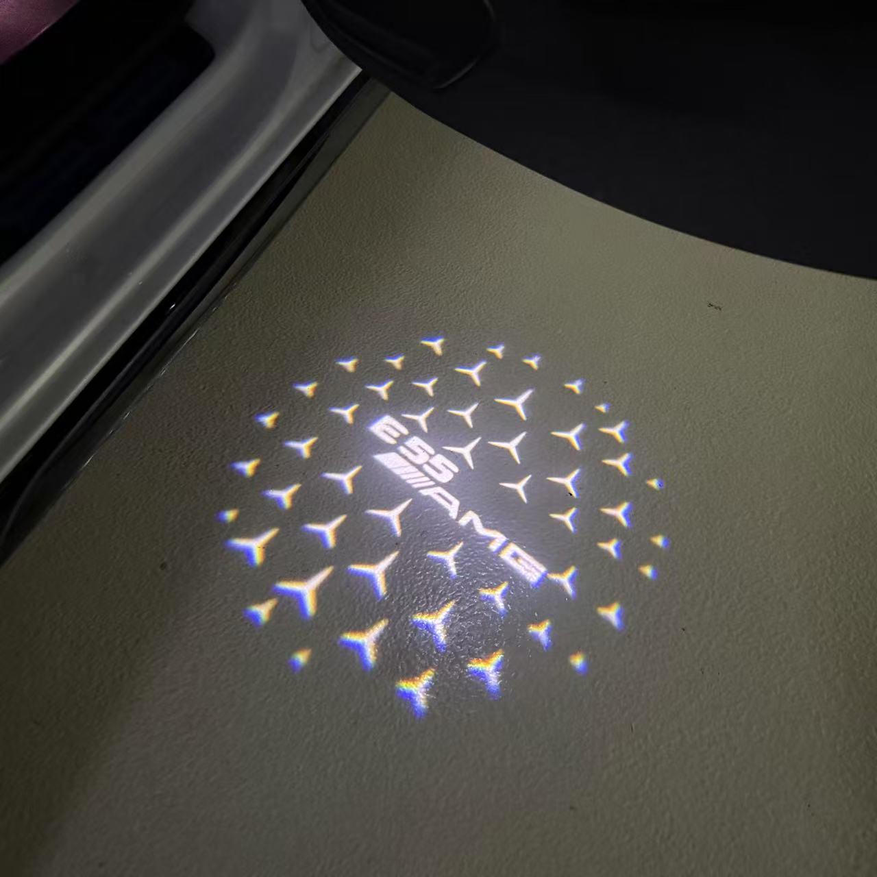 MERCEDES BENZ E55 AMG LOGO PROJECTOT LIGHTS  (quantity 1 = 1 set /2 door lights with 2 logo films)Nr.02M306