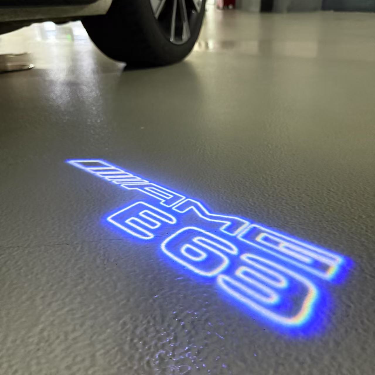 MERCEDES BENZ E63 AMG LOGO PROJECTOT LIGHTS  (quantity 1 = 1 set /2 door lights with 2 logo films)Nr.02M308