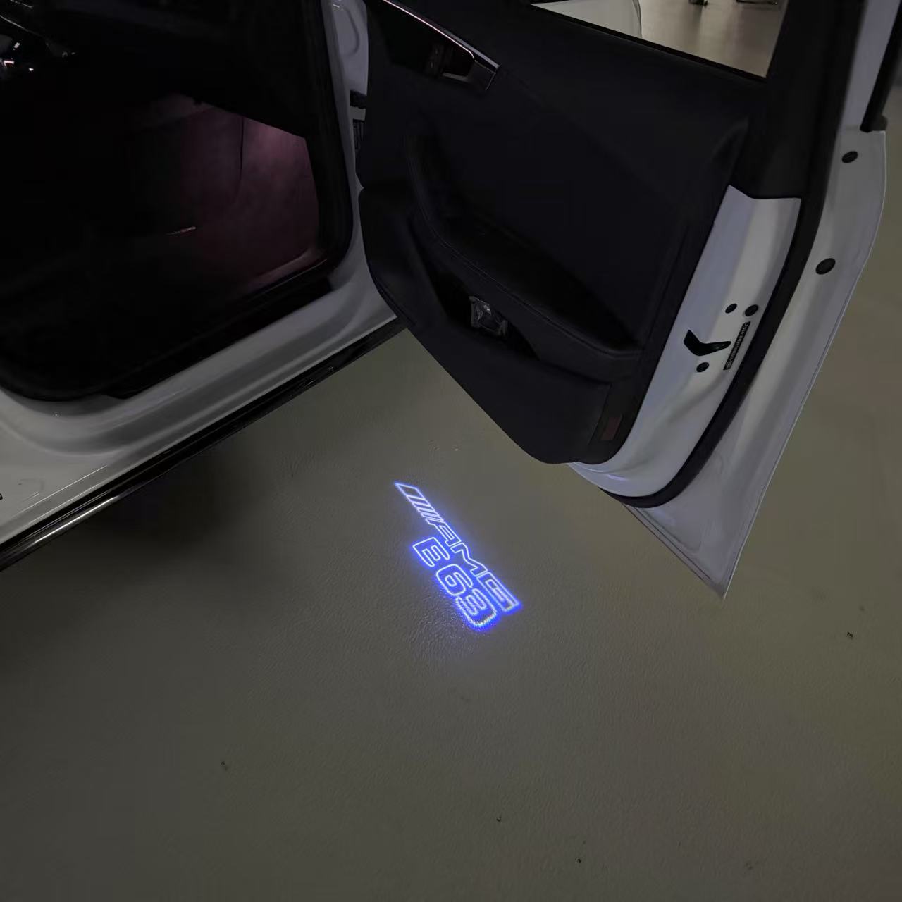 MERCEDES BENZ E63 AMG LOGO PROJECTOT LIGHTS  (quantity 1 = 1 set /2 door lights with 2 logo films)Nr.02M308