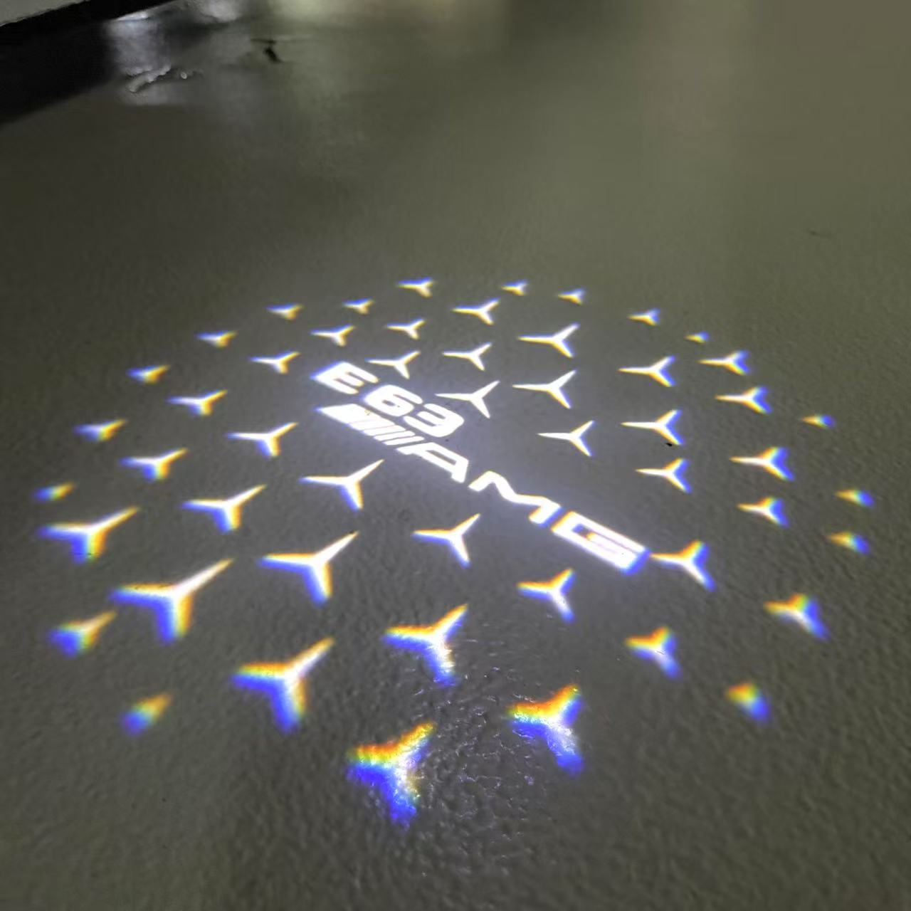 MERCEDES BENZ E63 AMG LOGO PROJECTOT LIGHTS  (quantity 1 = 1 set /2 door lights with 2 logo films)Nr.02M309