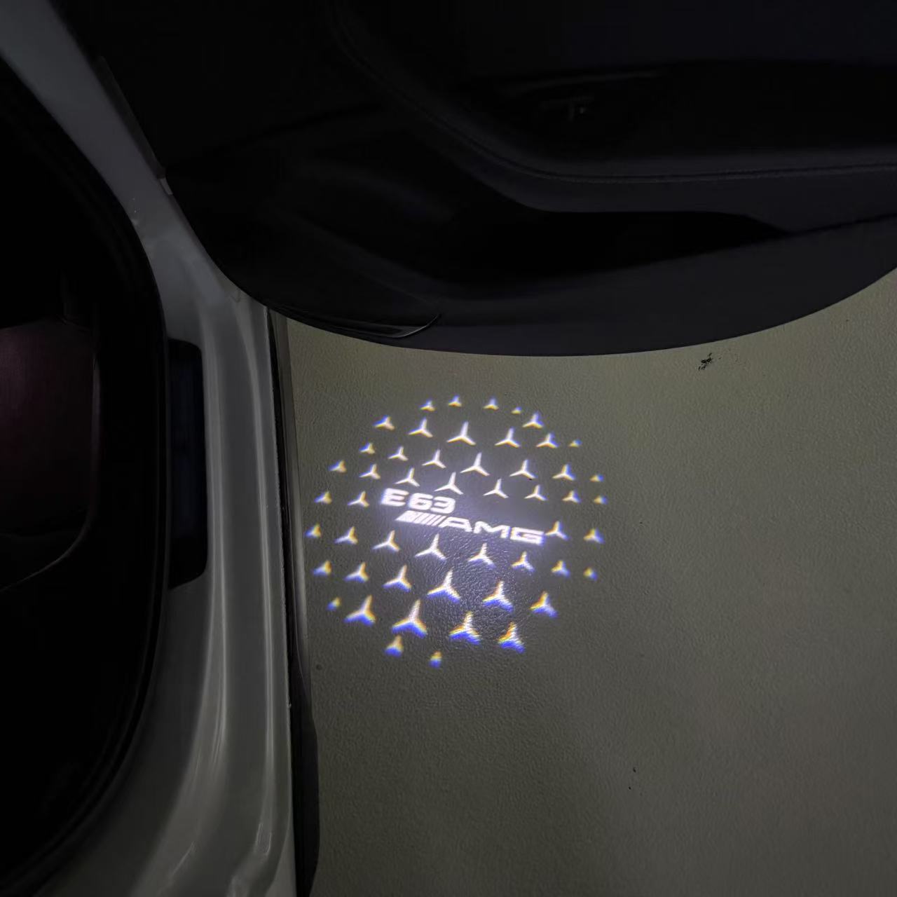 MERCEDES BENZ E63 AMG LOGO PROJECTOT LIGHTS  (quantity 1 = 1 set /2 door lights with 2 logo films)Nr.02M309