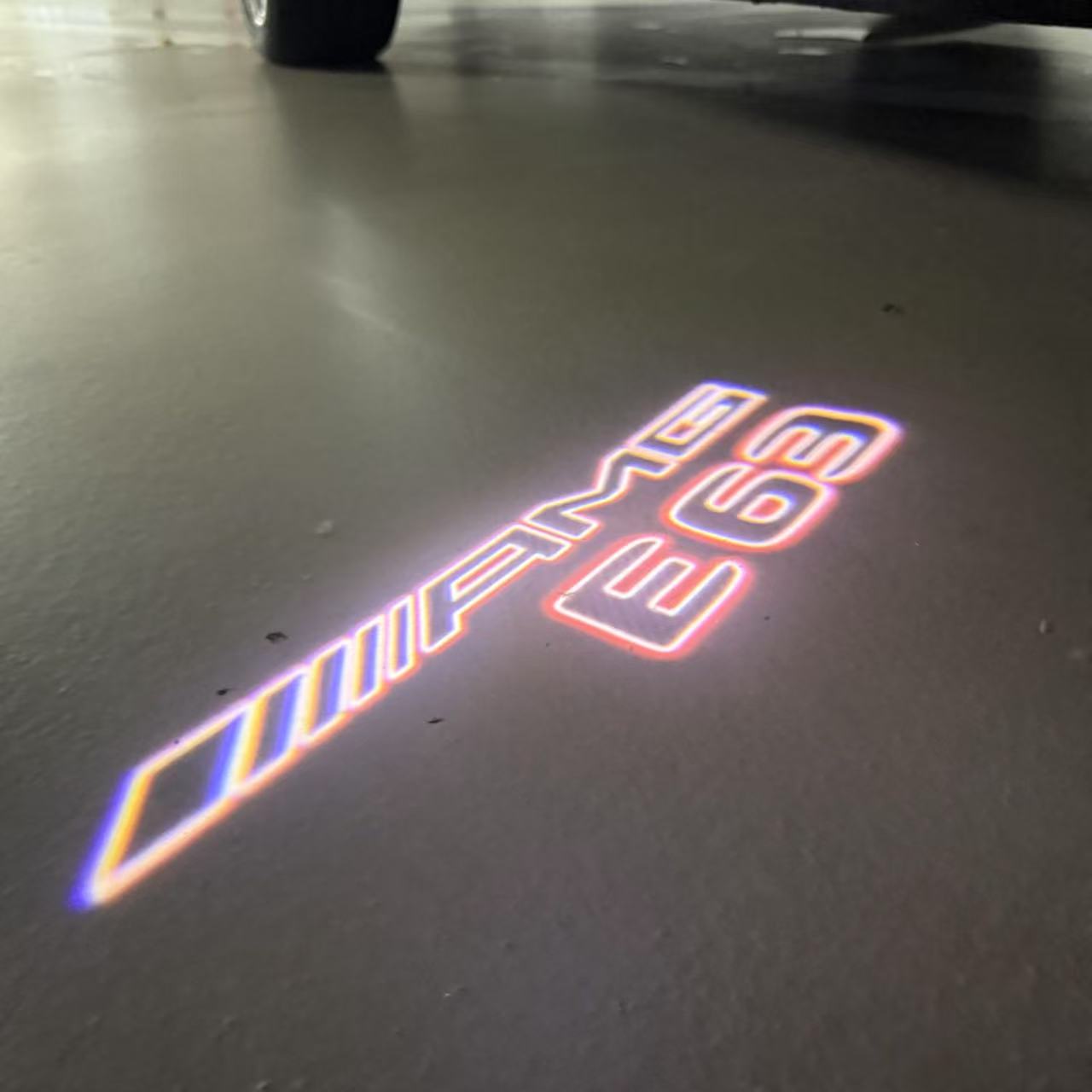 MERCEDES BENZ E63 AMG LOGO PROJECTOT LIGHTS  (quantity 1 = 1 set /2 door lights with 2 logo films)Nr.02M311