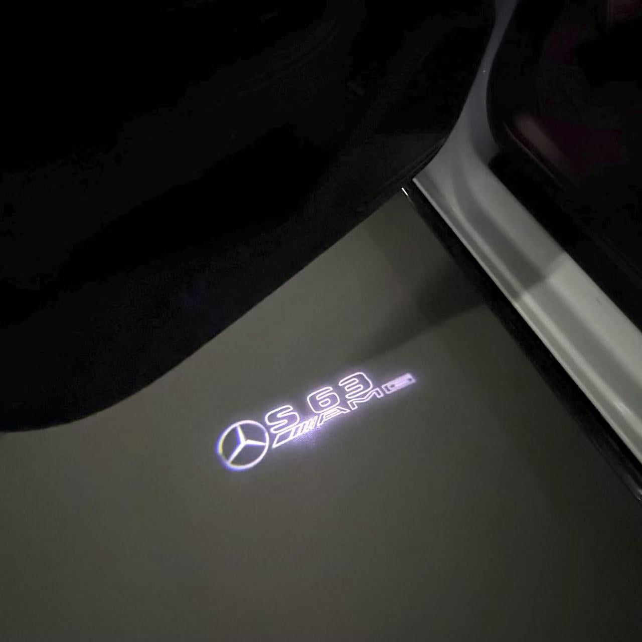 MERCEDES BENZ S63 AMG LOGO PROJECTOT LIGHTS  (quantity 1 = 1 set /2 door lights with 2 logo films)Nr.02M326