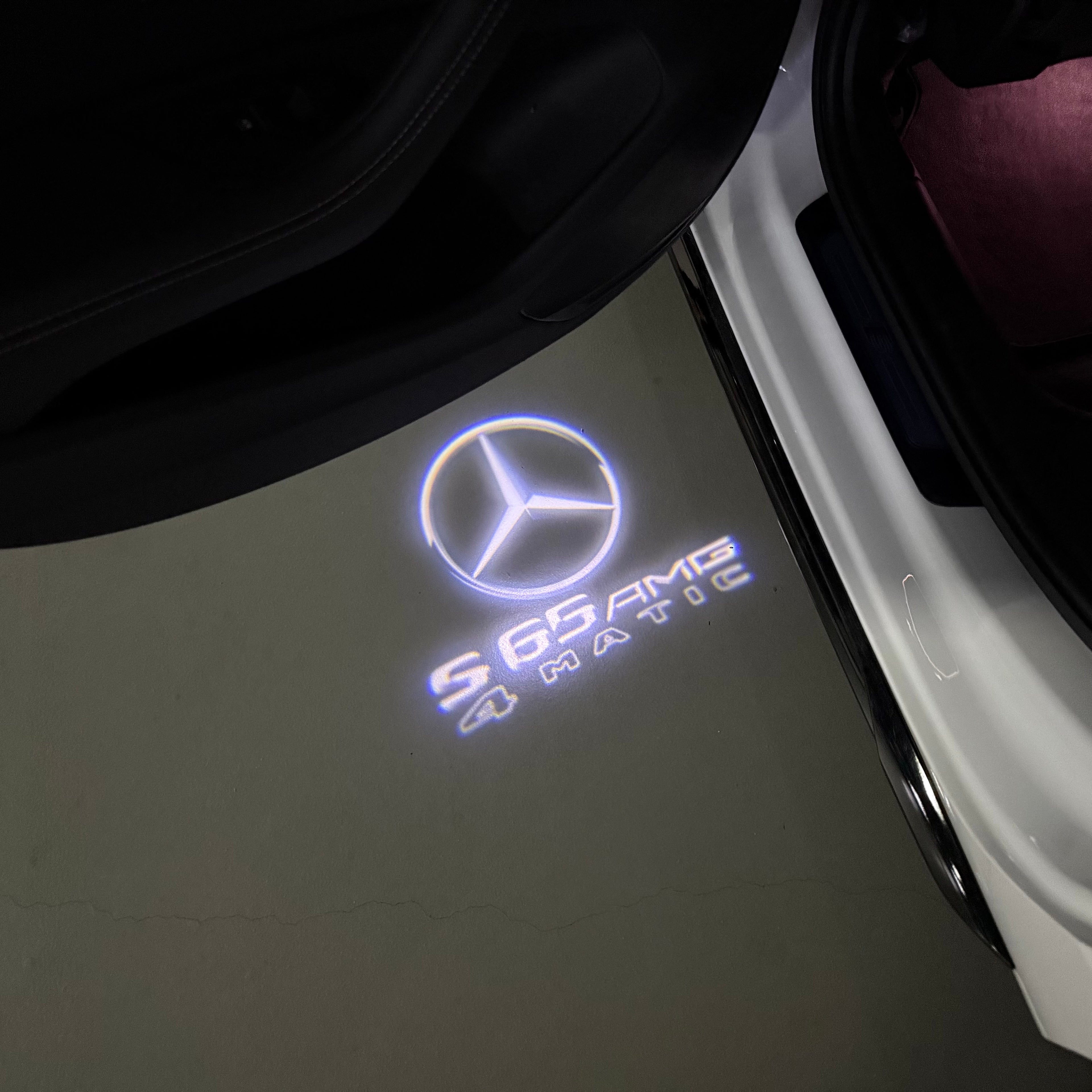 MERCEDES BENZ S65 AMG LOGO PROJECTOT LIGHTS  (quantity 1 = 1 set /2 door lights with 2 logo films)Nr.02M317