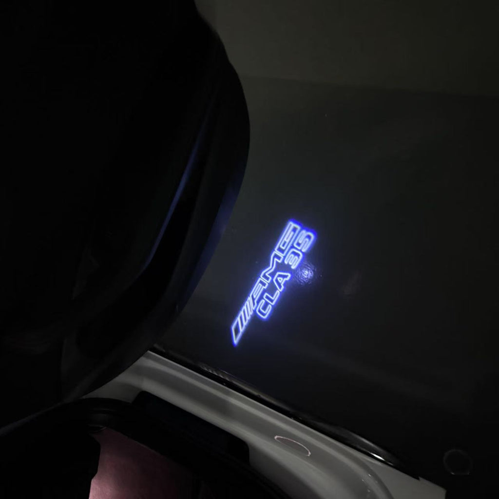 MERCEDES BENZ CLA 35 AMG LOGO PROJECTOT LIGHTS  (quantity 1 = 1 set /2 door lights with 2 logo films)Nr.02M265