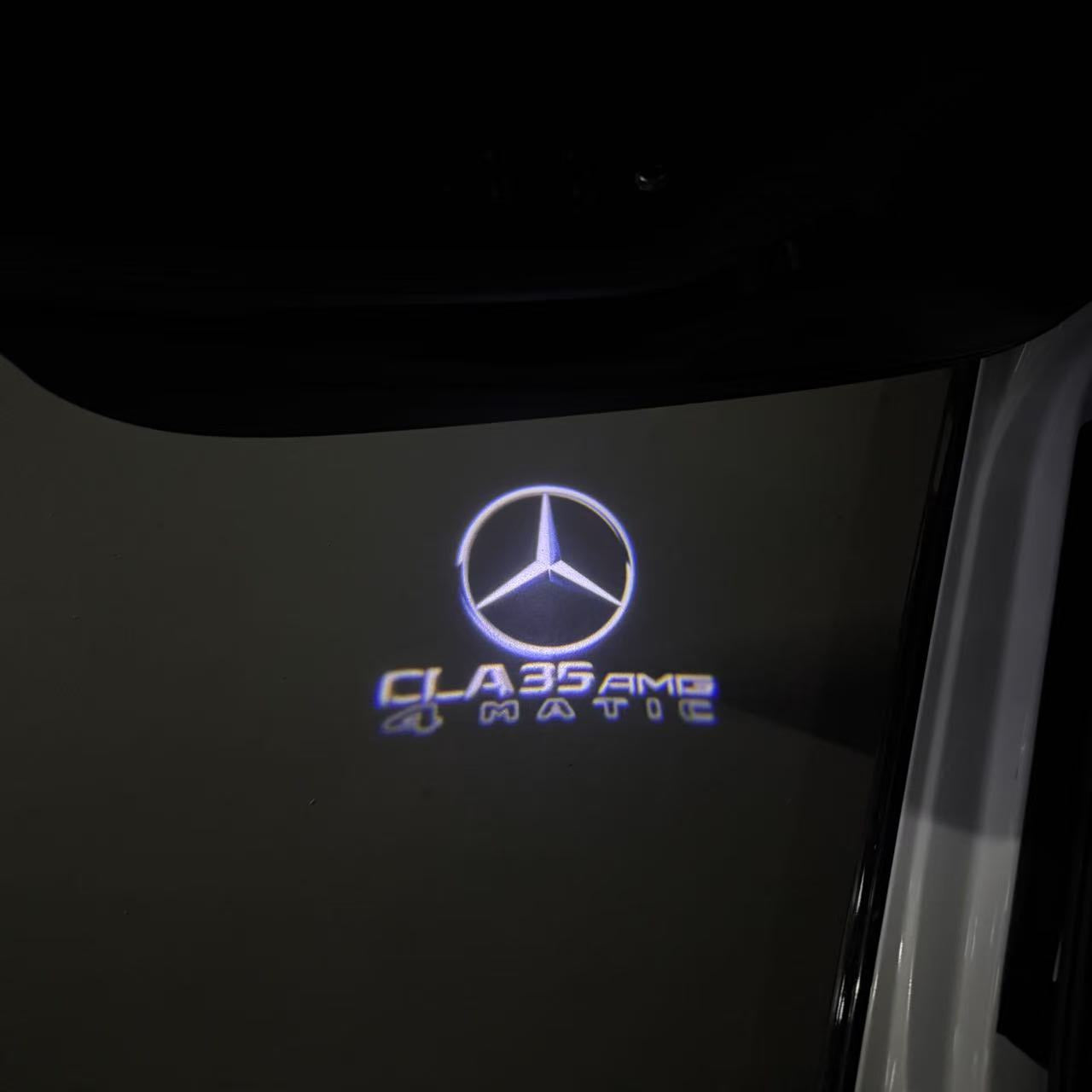 MERCEDES BENZ CLA35 AMG LOGO PROJECTOT LIGHTS  (quantity 1 = 1 set /2 door lights with 2 logo films)Nr.02M267