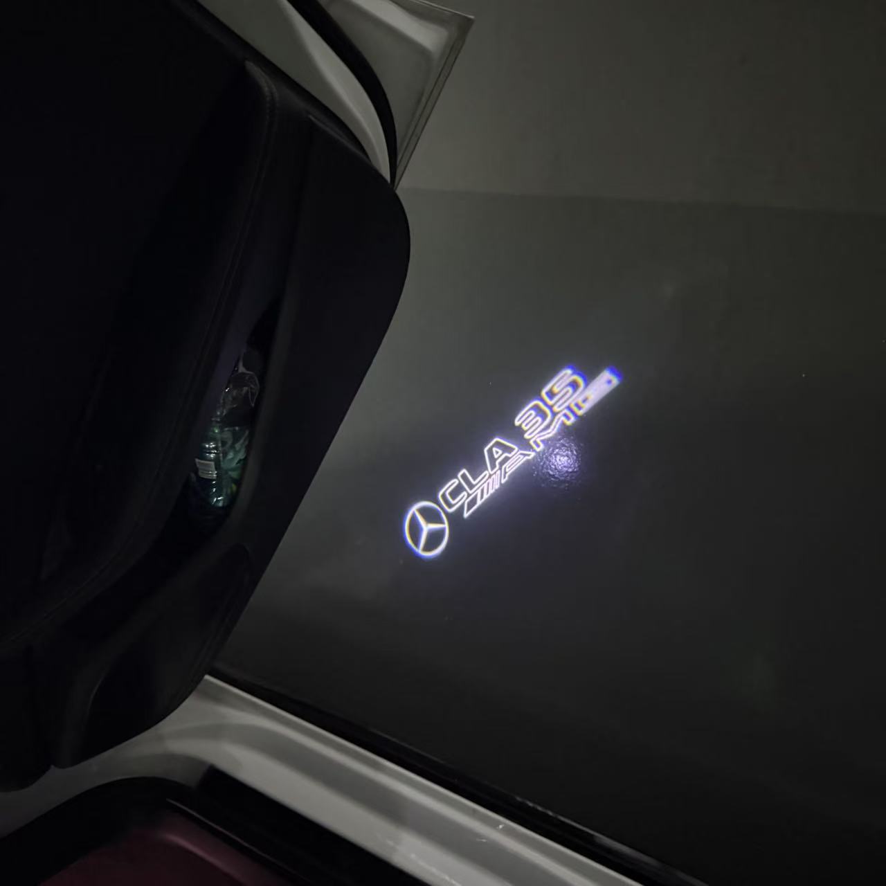MERCEDES BENZ CLA 35 AMG LOGO PROJECTOT LIGHTS  (quantity 1 = 1 set /2 door lights with 2 logo films)Nr.02M263