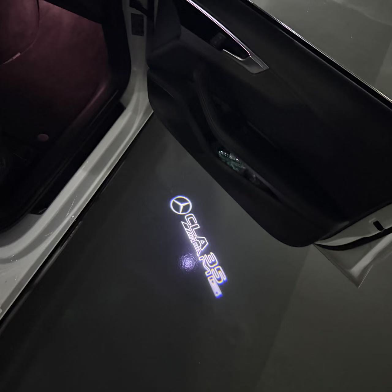 MERCEDES BENZ CLA 35 AMG LOGO PROJECTOT LIGHTS  (quantity 1 = 1 set /2 door lights with 2 logo films)Nr.02M263
