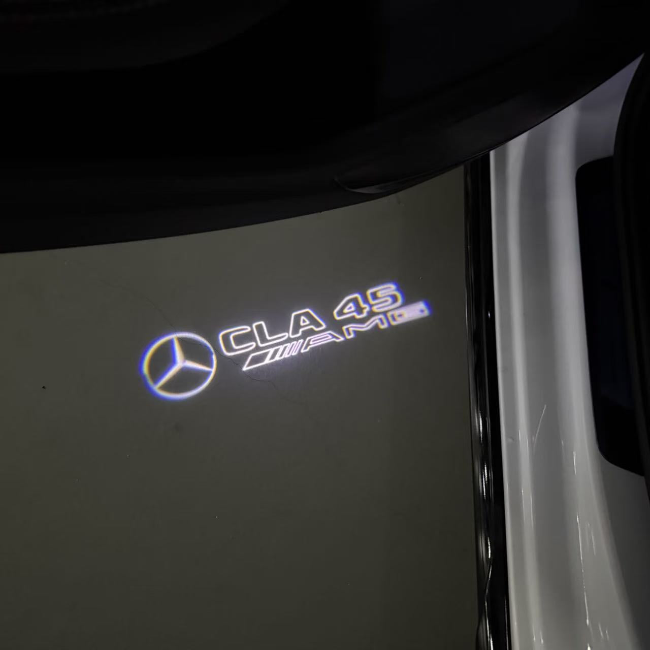 MERCEDES BENZ CLA45 AMG LOGO PROJECTOT LIGHTS  (quantity 1 = 1 set /2 door lights with 2 logo films)Nr.02M272
