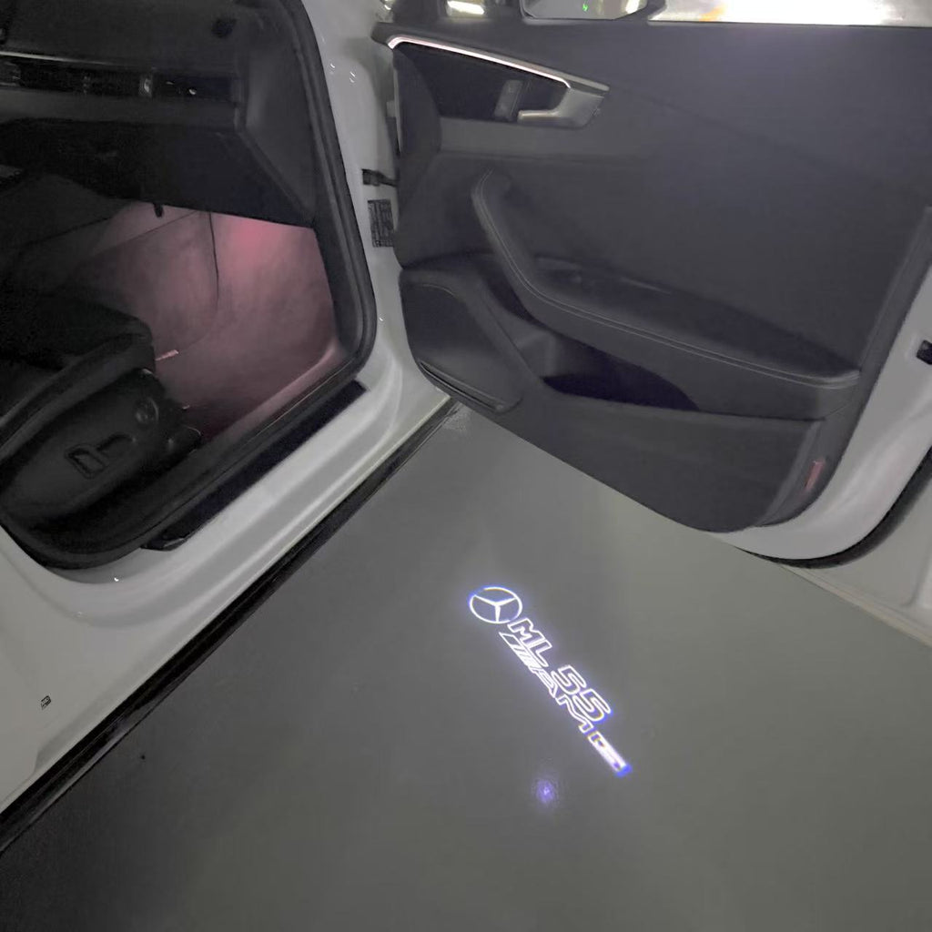 MERCEDES BENZ ML55 AMG LOGO PROJECTOT LIGHTS  (quantity 1 = 1 set /2 door lights with 2 logo films)Nr.02M385