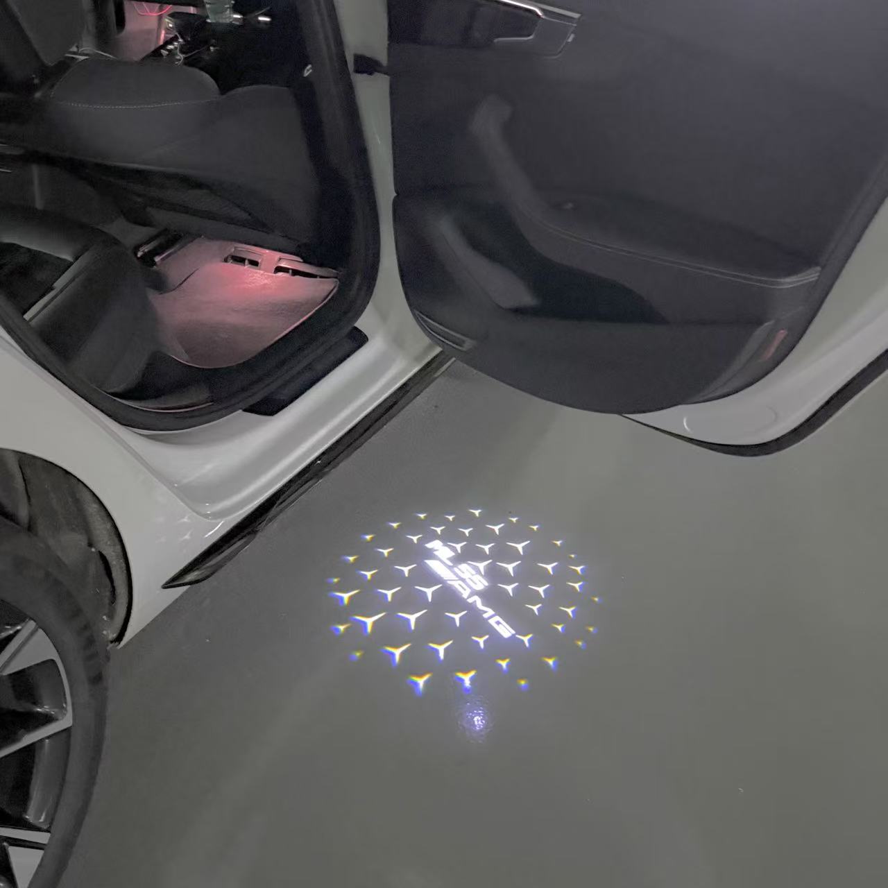 MERCEDES BENZ ML55 AMG LOGO PROJECTOT LIGHTS  (quantity 1 = 1 set /2 door lights with 2 logo films)Nr.02M384