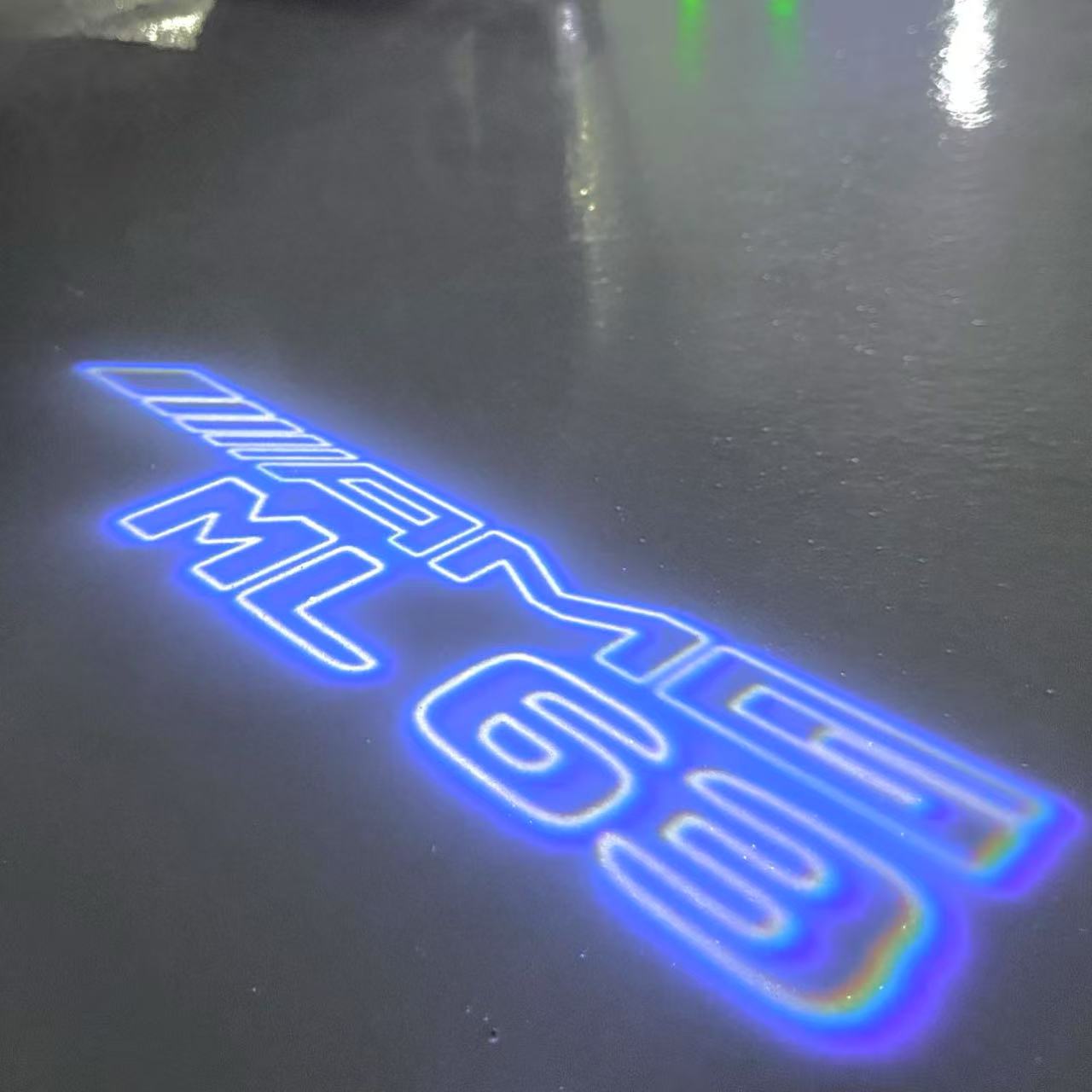 MERCEDES BENZ ML63 AMG LOGO PROJECTOT LIGHTS  (quantity 1 = 1 set /2 door lights with 2 logo films)Nr.02M389