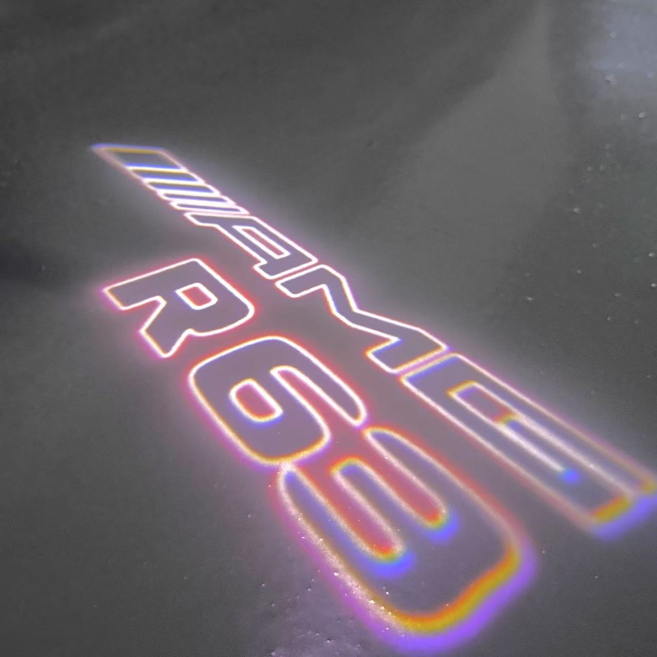 MERCEDES BENZ R63 AMG LOGO PROJECTOT LIGHTS  (quantity 1 = 1 set /2 door lights with 2 logo films)Nr.02M393