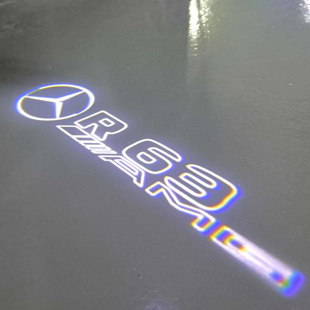MERCEDES BENZ R63 AMG LOGO PROJECTOT LIGHTS  (quantity 1 = 1 set /2 door lights with 2 logo films)Nr.02M394