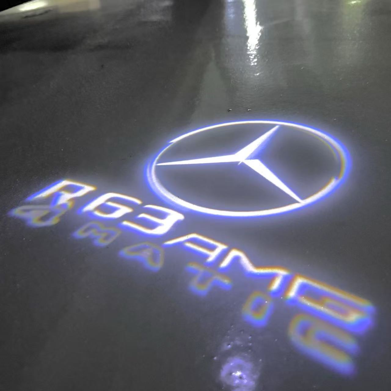 MERCEDES BENZ R63 AMG LOGO PROJECTOT LIGHTS  (quantity 1 = 1 set /2 door lights with 2 logo films)Nr.02M397