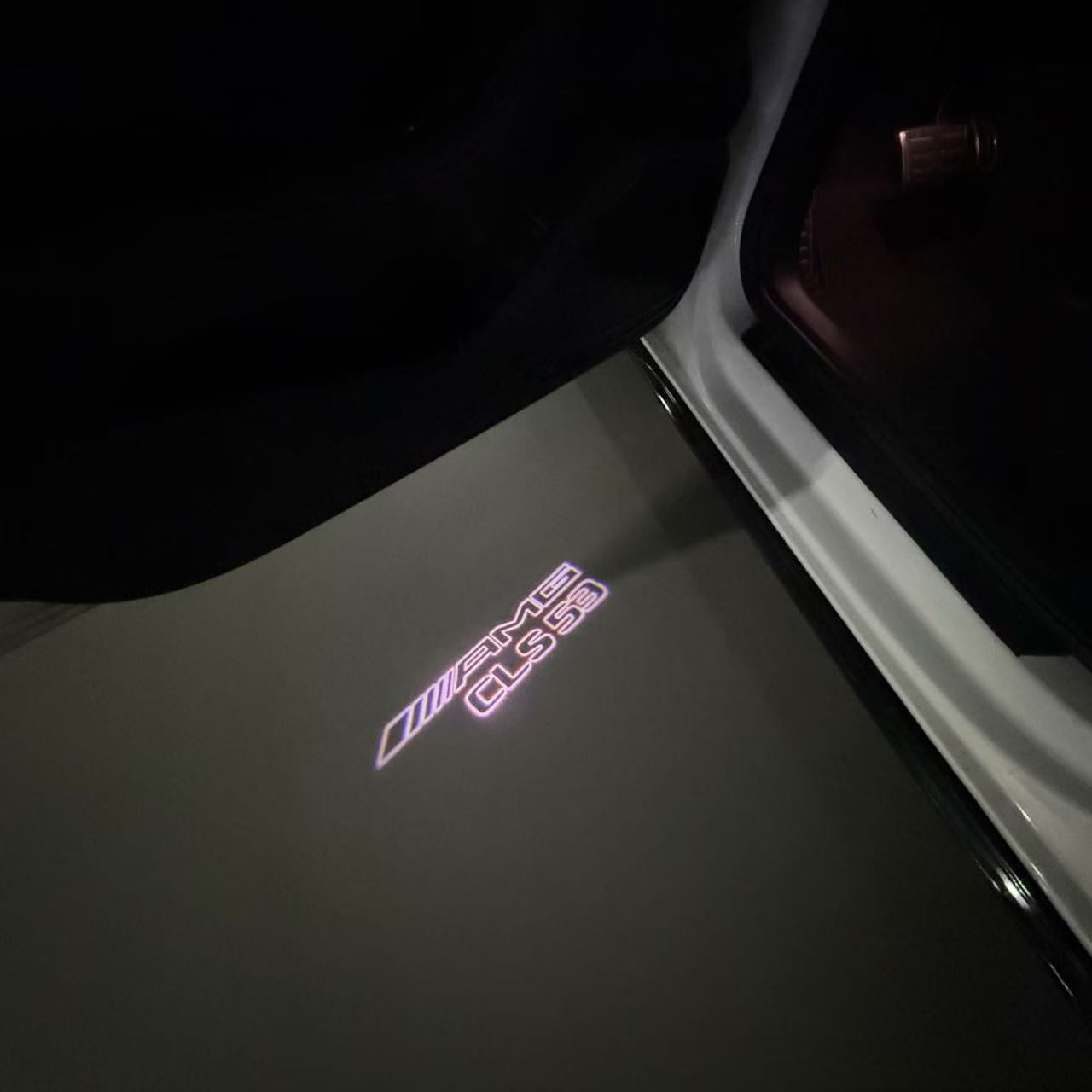 MERCEDES BENZ CLS53 AMG LOGO PROJECTOT LIGHTS  (quantity 1 = 1 set /2 door lights with 2 logo films)Nr.02M275