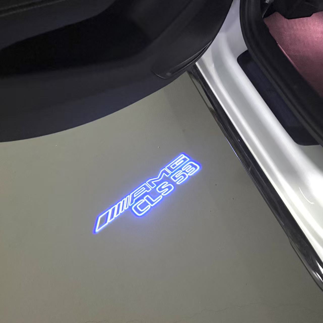 MERCEDES BENZ CLS53 AMG LOGO PROJECTOT LIGHTS  (quantity 1 = 1 set /2 door lights with 2 logo films)Nr.02M273