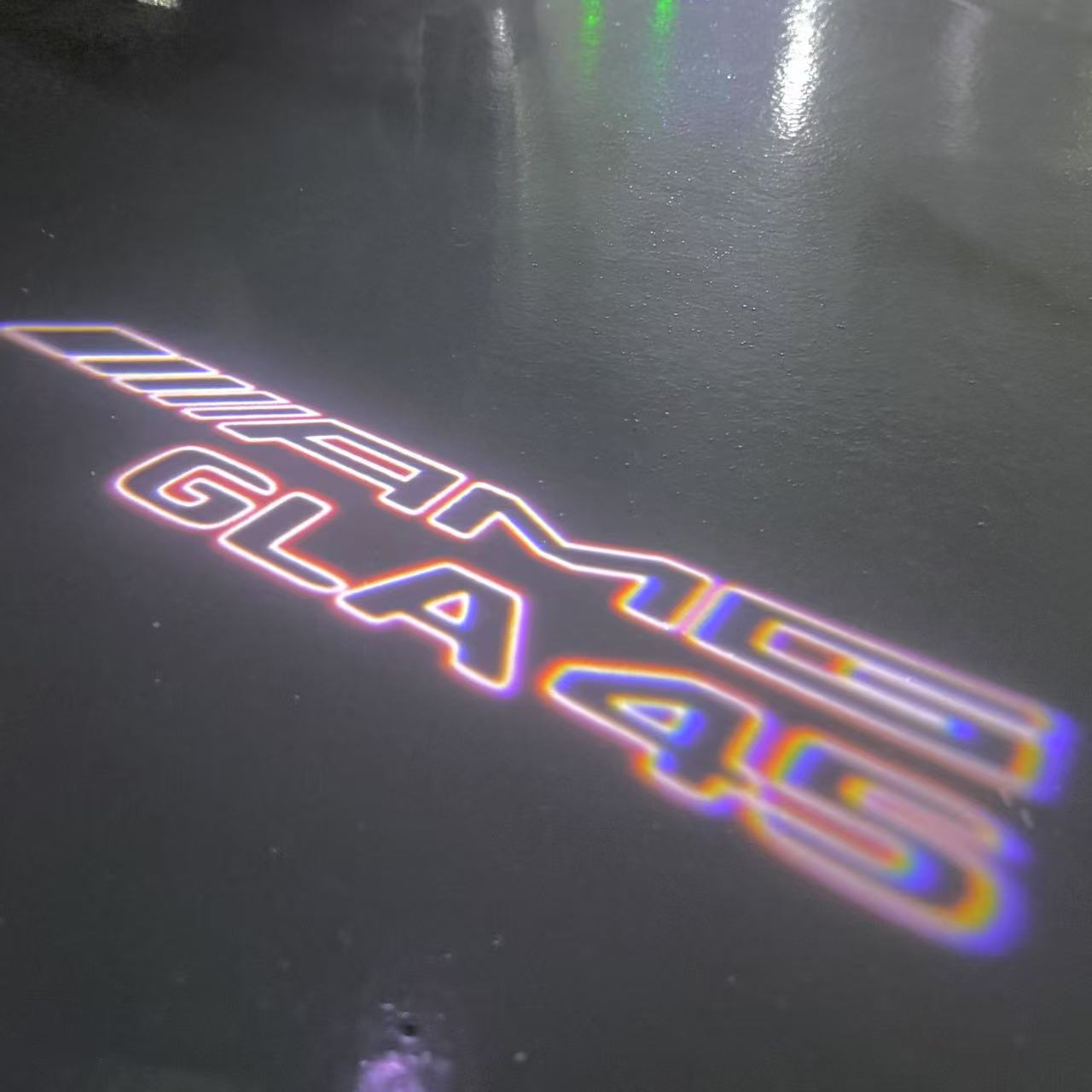 MERCEDES BENZ GLA45 AMG LOGO PROJECTOT LIGHTS  (quantity 1 = 1 set /2 door lights with 2 logo films)Nr.02M344