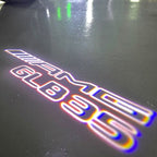 MERCEDES BENZ GLB35 AMG LOGO PROJECTOT LIGHTS  (quantity 1 = 1 set /2 door lights with 2 logo films)Nr.02M348