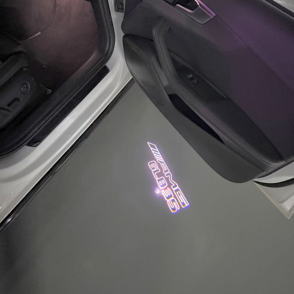 MERCEDES BENZ GLB35 AMG LOGO PROJECTOT LIGHTS  (quantity 1 = 1 set /2 door lights with 2 logo films)Nr.02M348